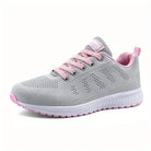 Unisex grijze orthopedische sneakers voor mannen en vrouwen, schuine hoek