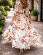 Elegante bloemenprint maxi-jurk met ceintuur en ronde hals