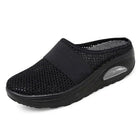 Zijaanzicht orthopedische pantoffels voor dames met retro platformzool