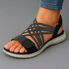 Detailopname van de gevlochten elastische bandjes van de Veira orthopedische sandaal