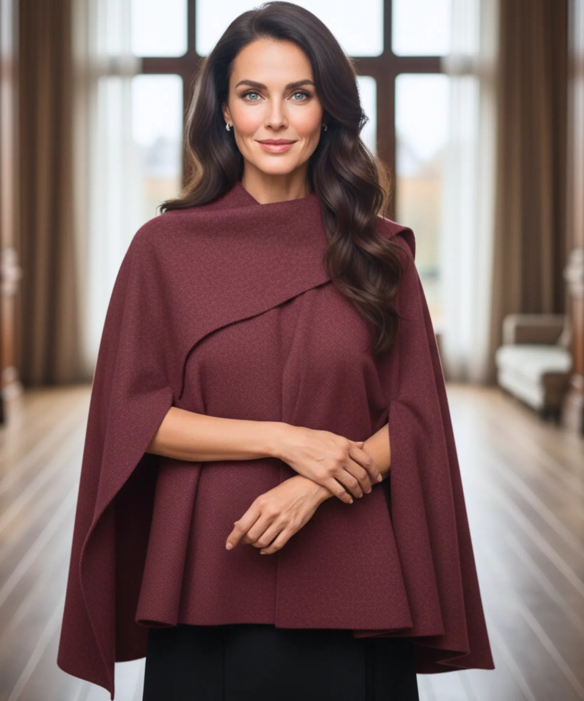 Vrouw in oversized wollen wrapjas in houtskoolgrijs