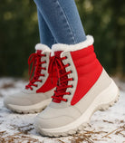 Rode dames snowboots met bontkraag en waterdichte gewatteerde schacht
