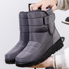 Mila winterlaarzen in blauw op besneeuwde ondergrond