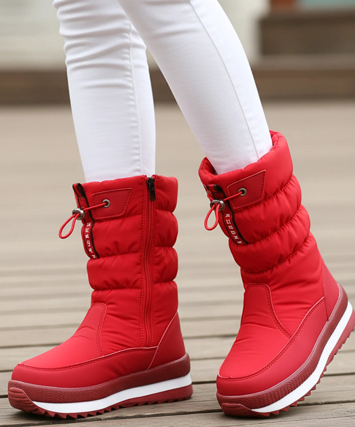 Celina dames waterproof puffer snowboots zwart met sherpa voering vooraanzicht