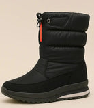Celina dames snowboots zwart gedragen met jeans winterstyling