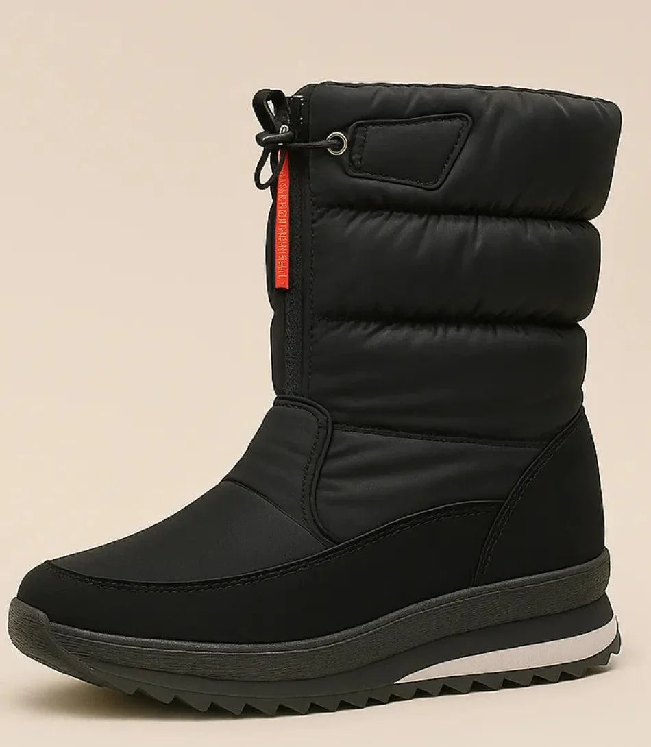 Celina dames snowboots zwart gedragen met jeans winterstyling