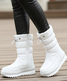 Celina gewatteerde snowboots dames zwart zijrits detail close-up