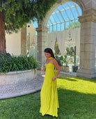 Gele geplooide maxi-jurk met strapless ontwerp voor dames