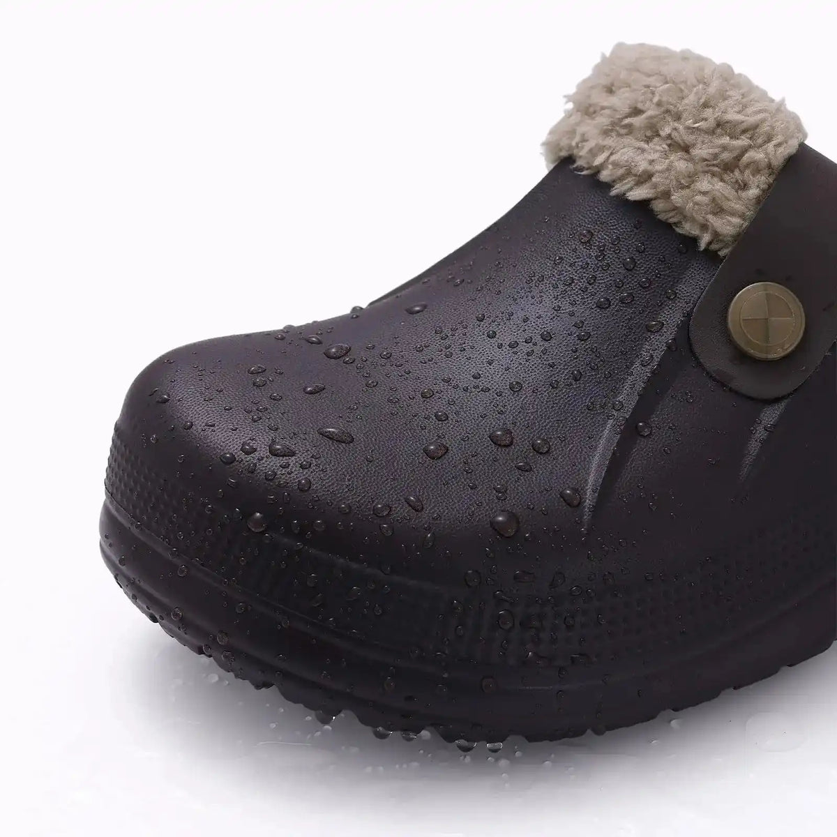 Paar pantoffels met waterafstotende PU-afwerking in bruin