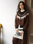 Detailopname diamant jacquard breisel van de Liora wollen cardigan