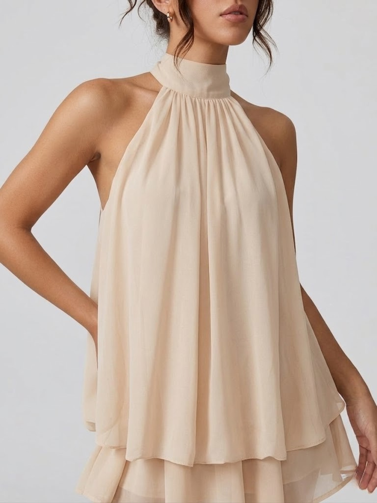 Paloma mini-jurk in zwart met hoge halterneck en open rug