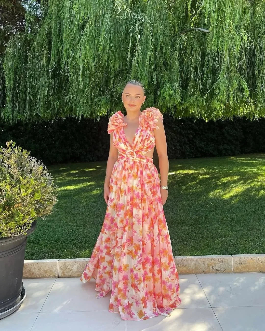 Roze mouwloze maxi-jurk met elegante pasvorm