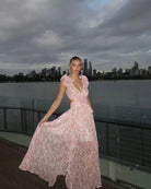 Full-length weergave oranje floral maxi-jurk Rosalinde
