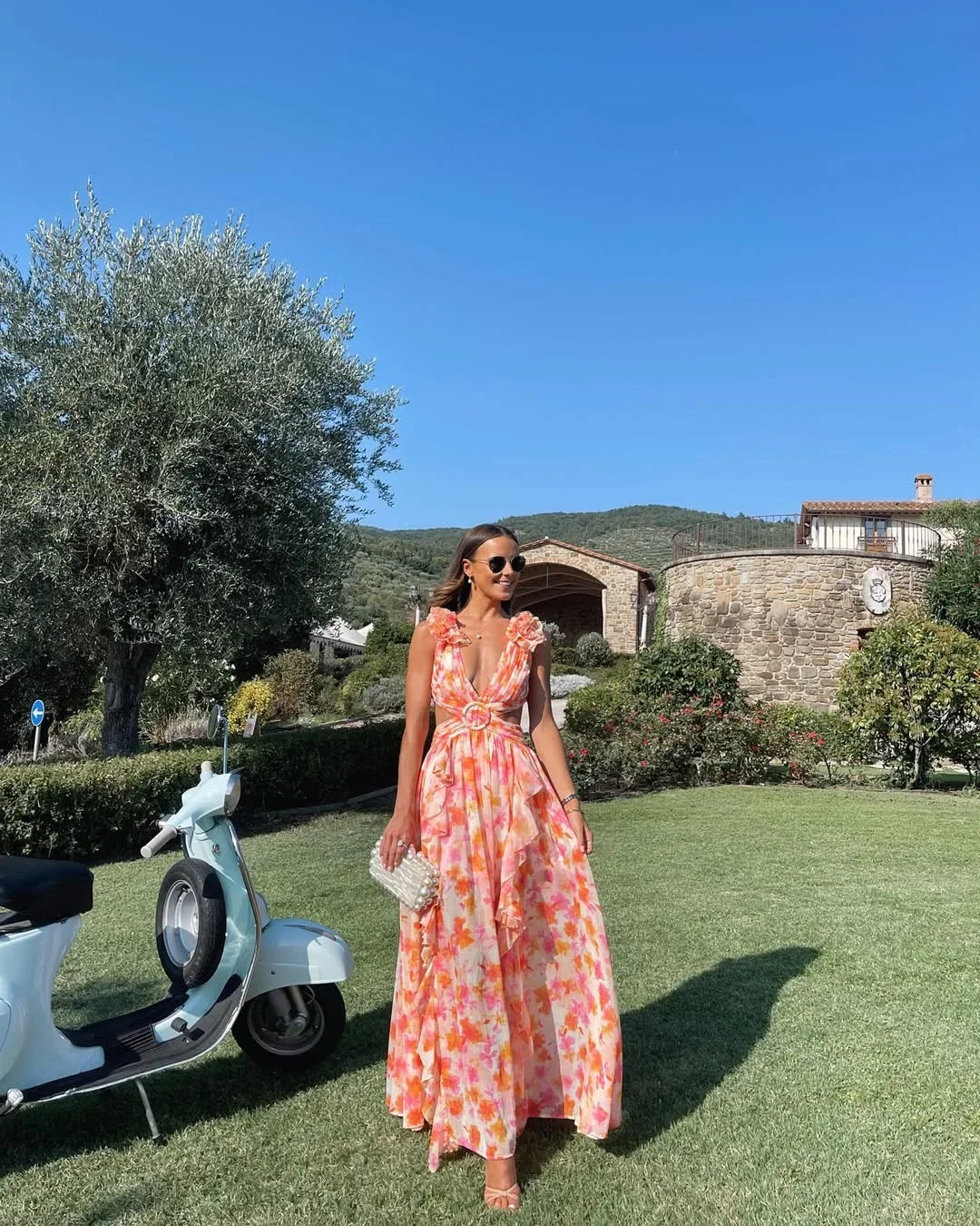 Roze mouwloze maxi-jurk met romantische bloemenprint