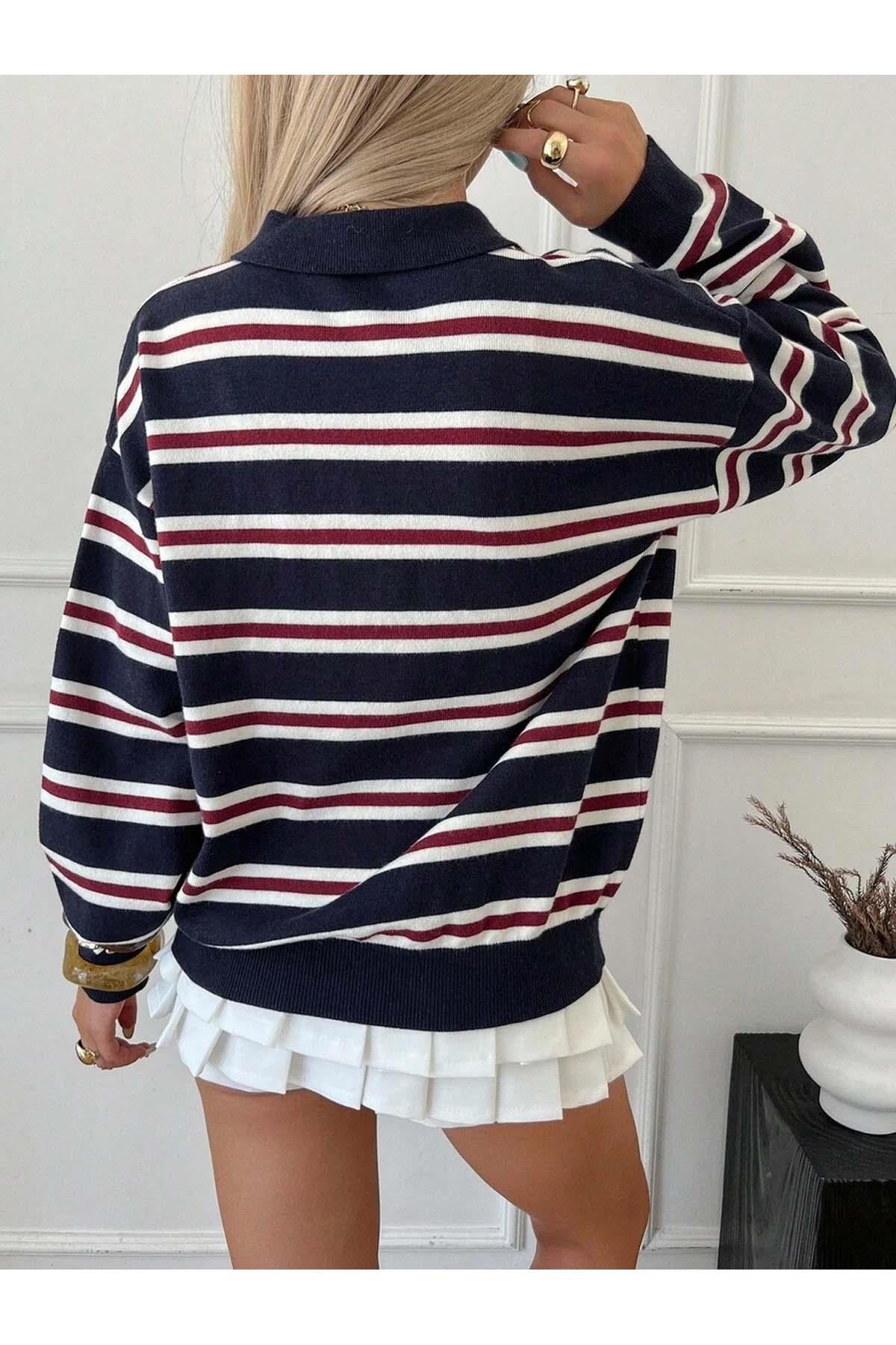 Detailopname gebreide stof Selma polokraag trui