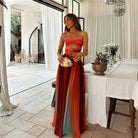 Dames strapless maxi-jurk in rood en oranje met vloeiende snit